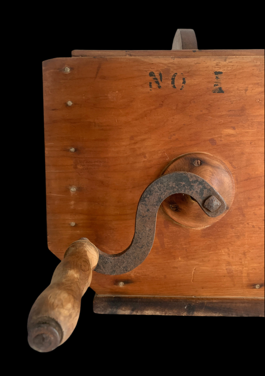 Close-up of crank handle on vintage No. 1 butter churn
