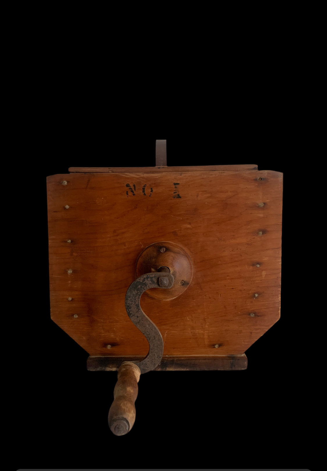 Front view of vintage No. 1 wooden butter churn with hand crank
