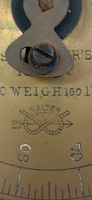 Close-up of Salter scale face with 150lb weight markings
