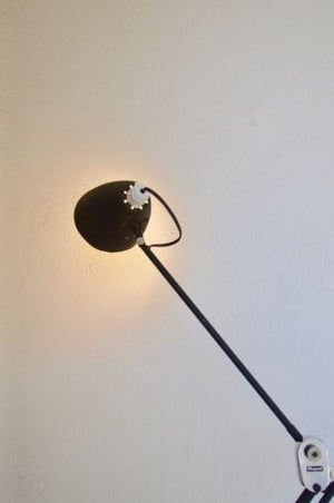Collectible black Planet lamp on Chrome base with casters 
