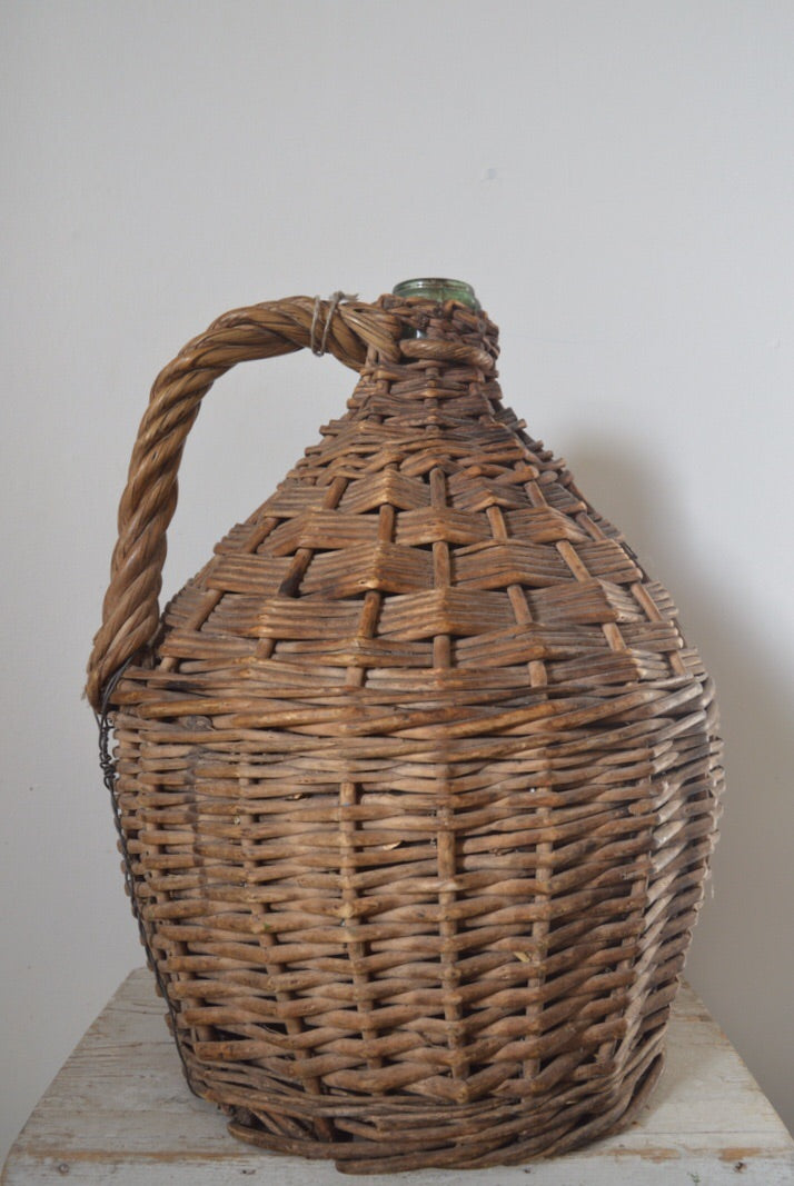 Vintage wine Demijohn in original cane basket