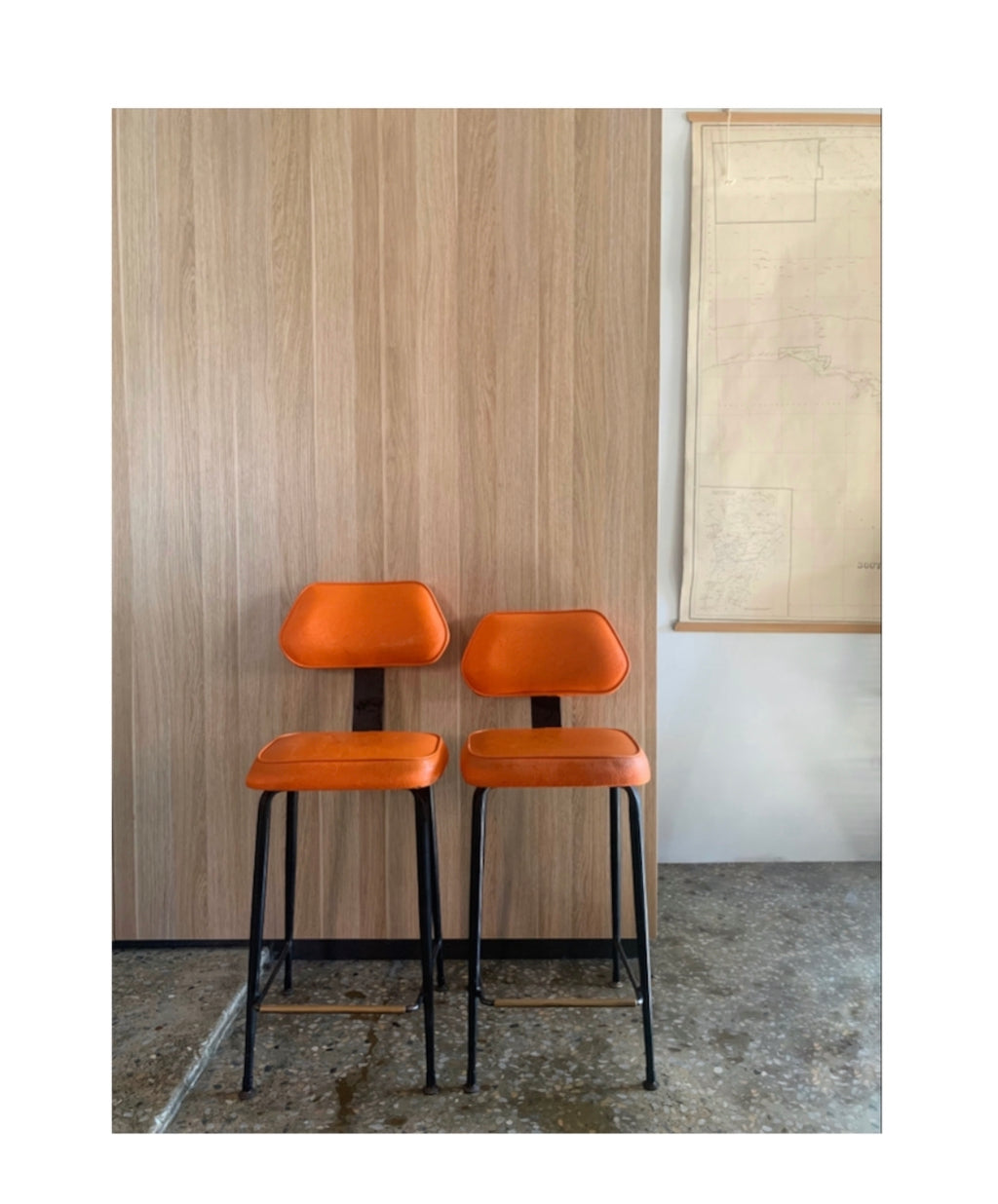 Pair vintage retro orange vinyl stools
