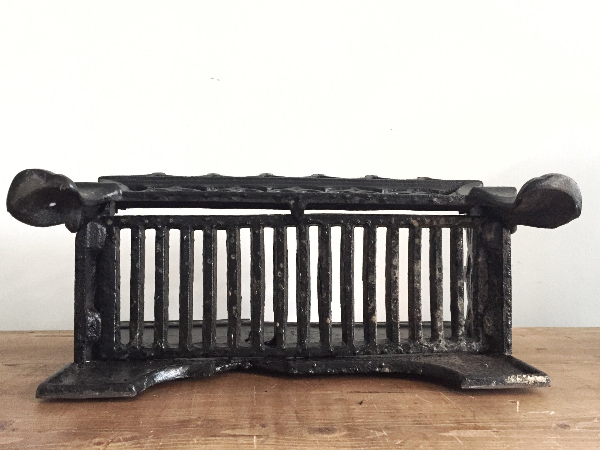 Vintage black wrought iron fire grate a/f has crack