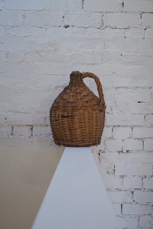 Vintage wine Demijohn in original cane basket
